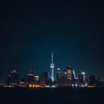 City Skyline Under a Starry Sky