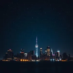 City Skyline Under a Starry Sky