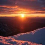 Golden Sunrise Over Snowy Mountains