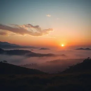 Sunrise Over Misty Hills