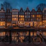 Amsterdam Canal Houses Bicycles Scene