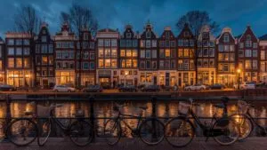Amsterdam Canal Houses Bicycles Scene