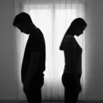 Love and Silence Couple Silhouette in Room Window