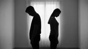Love and Silence Couple Silhouette in Room Window