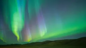 Northern Lights Over Hills