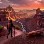 Traveler Walking Through Canyon Trails at Sunrise