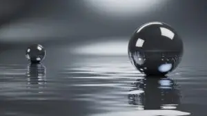 Chrome Sphere Reflections Over Liquid Floor
