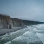 Coastal Fog Rolling Over Cliffs Ocean