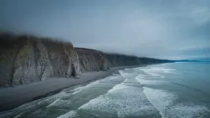 Coastal Fog Rolling Over Cliffs Ocean