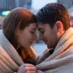 Couple Sharing a Blanket on a Cold Day