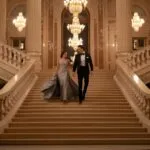 Couple Walking Down Stairs Grand Hall Elegant
