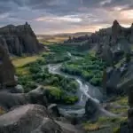 Deep Valley Surrounded by High Cliffs