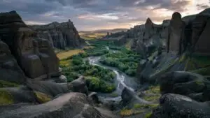 Deep Valley Surrounded by High Cliffs
