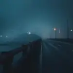 Fog Covering City Bridge at Night