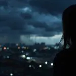 Girl Looking Out at Stormy Night City