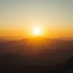 Golden Sunrise Over Mountain Range