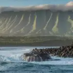 Ocean Waves Hitting Black Lava Rocks