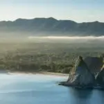 Ocean’s Edge: Rugged Coastal View with Vast Open Sky