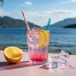 Pink Lemonade with Ice Cubes on Clean Table