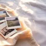Polaroid Photos Scattered on Soft Blanket
