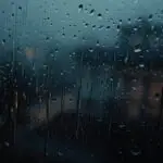 Rain Hitting Window at Night
