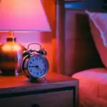 Retro Alarm Clock Beside Bedside Lamp