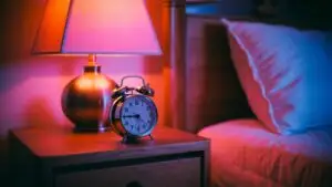 Retro Alarm Clock Beside Bedside Lamp