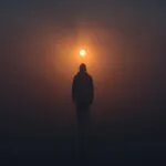 Silhouette Walking in Mist