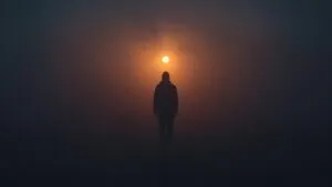 Silhouette Walking in Mist