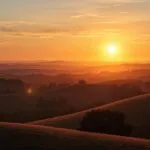 Sunset Light Over Rolling Hills