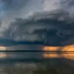 Thunderstorm Over Summer Lake at Evening