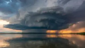 Thunderstorm Over Summer Lake at Evening