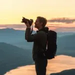 Traveler Taking Photo of Horizon