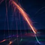 Vibrant Color Streaks Stretching Across Darkness