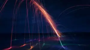 Vibrant Color Streaks Stretching Across Darkness