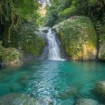 Waterfall Falling Into Crystal Pool