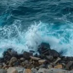 Waves Crashing Against Rocky Shore