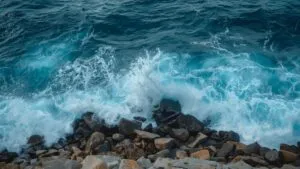Waves Crashing Against Rocky Shore