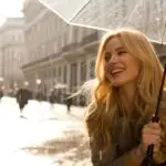 Woman Holding an Umbrella Under Light Rain