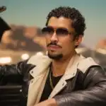 Bad Bunny Driving Through a Desert Highway