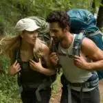 Couple Hiking Together on a Forest Trail