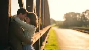 Couple Holding Each Other on a Wooden Bridge