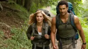 Couple With Backpacks Hiking Forest Path Exploration