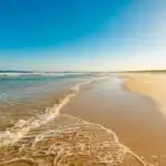 Crystal Clear Turquoise Water on Yellow Sand