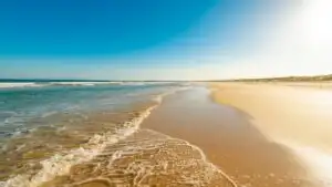 Crystal Clear Turquoise Water on Yellow Sand