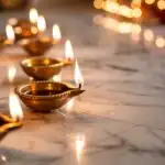Diwali Diyas on Marble Floor With Warm Glow
