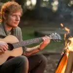 Ed Sheeran Playing Guitar Beside Campfire