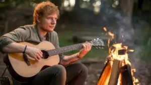 Ed Sheeran Playing Guitar Beside Campfire