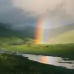 Green Valley Under Bright Rainbow