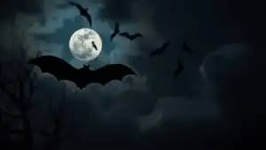 Halloween Bats Flying Over Moonlit Sky